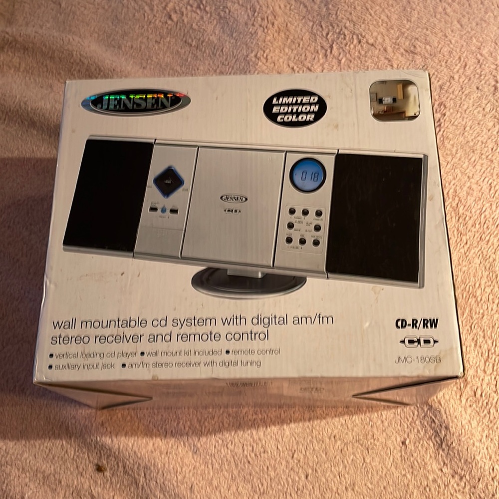 Brand new in box Jensen wall mountable c/d system